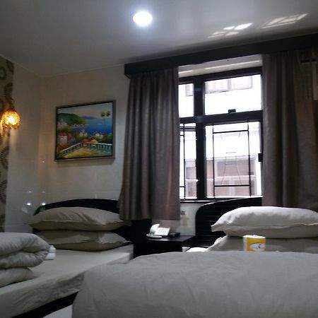 Tom'S Guest House Цзюлун Экстерьер фото