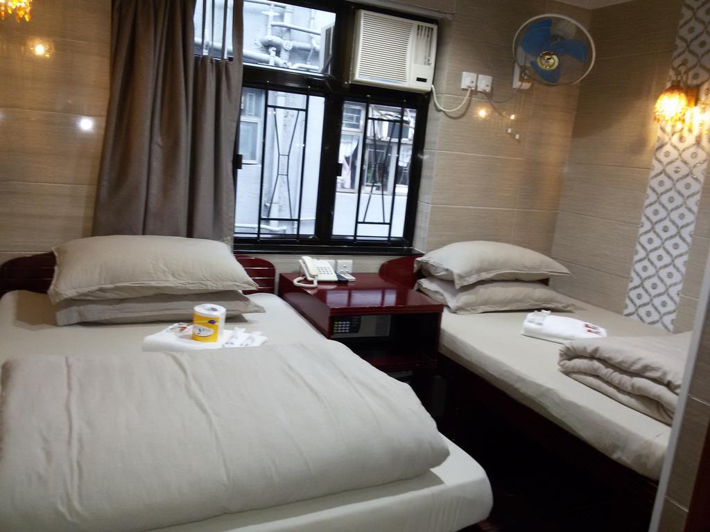 Tom'S Guest House Цзюлун Экстерьер фото
