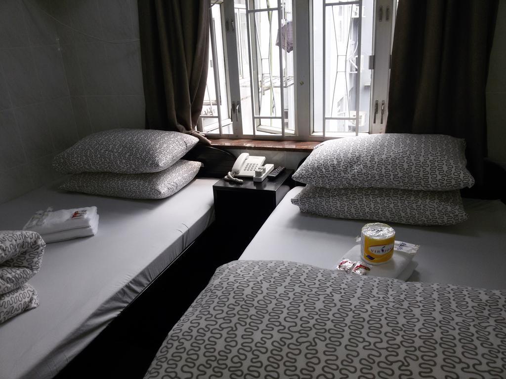 Tom'S Guest House Цзюлун Экстерьер фото