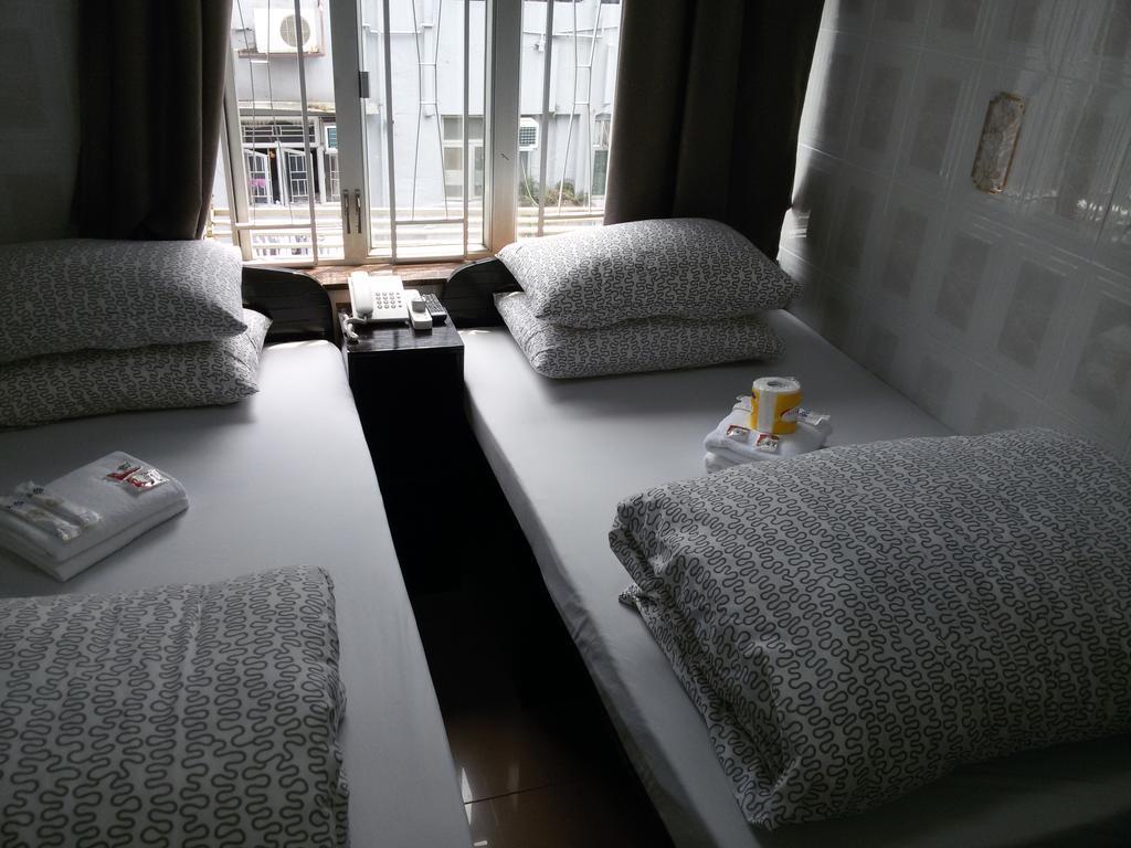 Tom'S Guest House Цзюлун Экстерьер фото