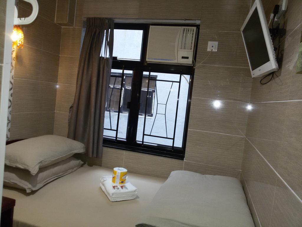 Tom'S Guest House Цзюлун Экстерьер фото