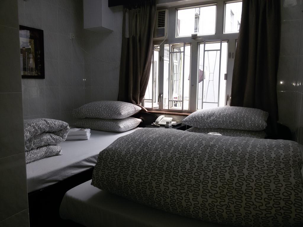 Tom'S Guest House Цзюлун Экстерьер фото